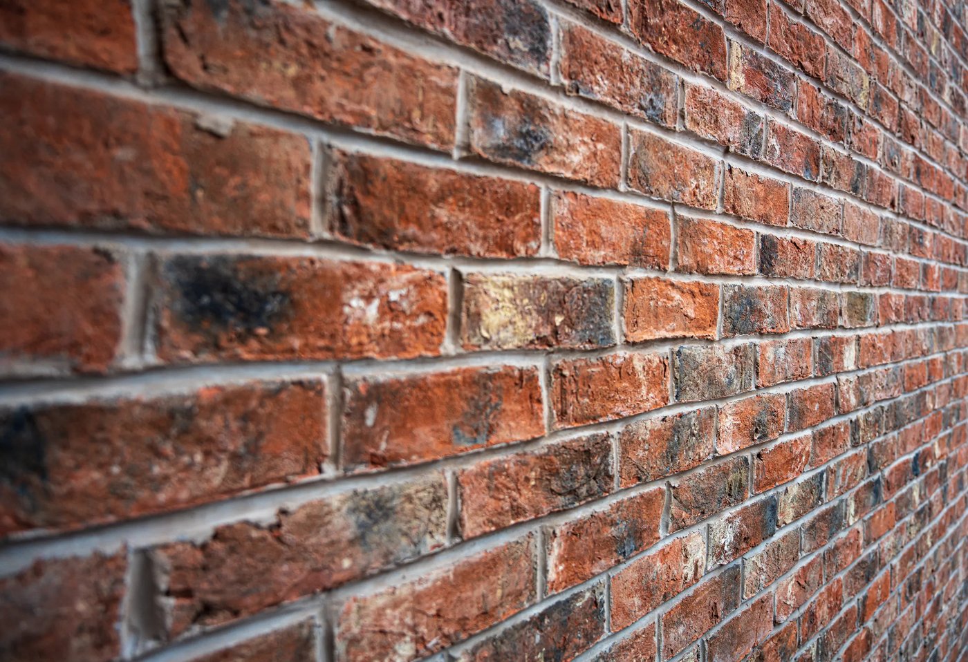 Reclaimed red brickwork with neat mortar joints